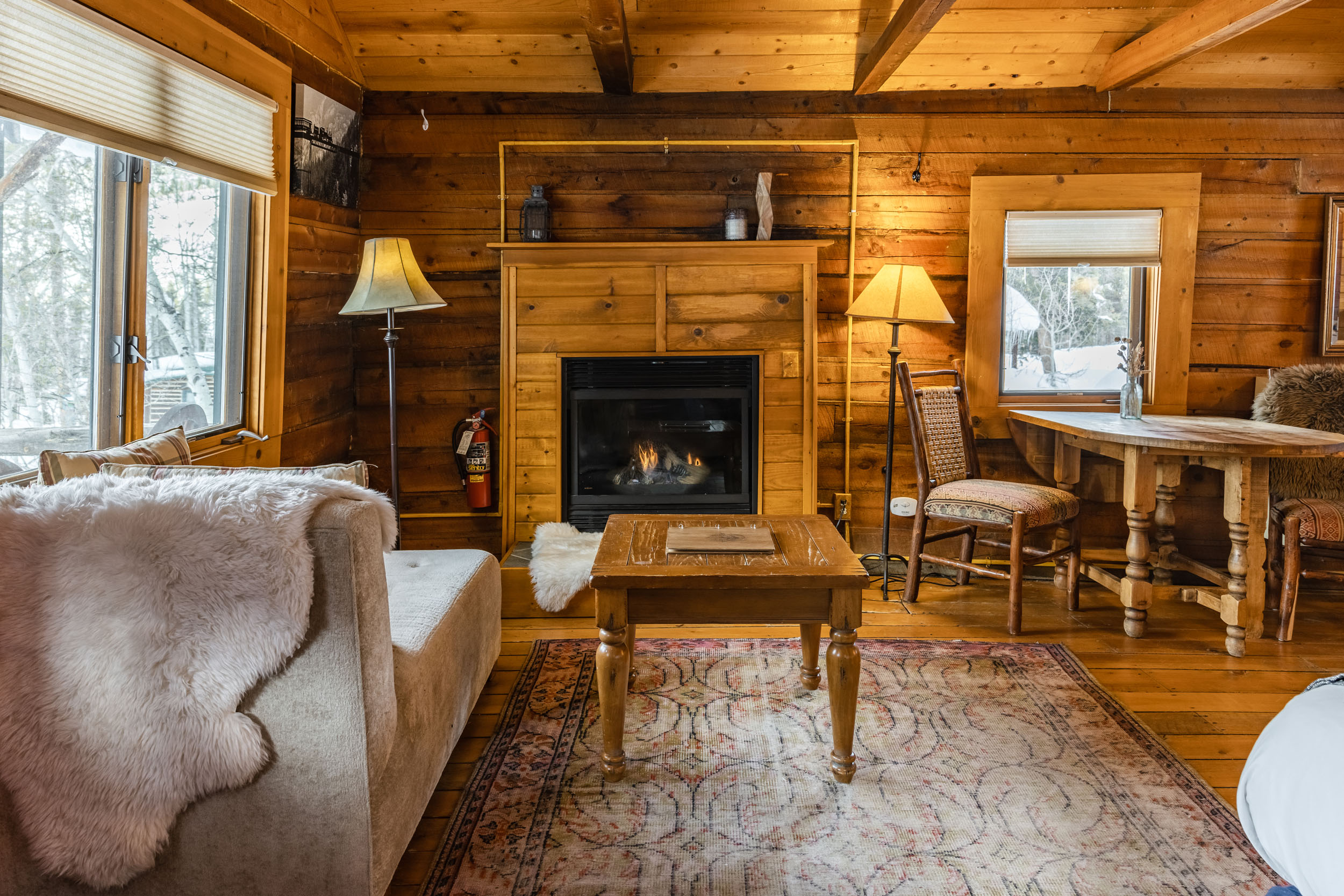Cozy cabin interior with fireplace