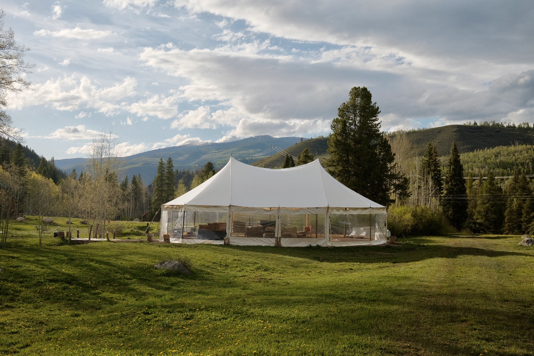 The Gathering Tent by the pond